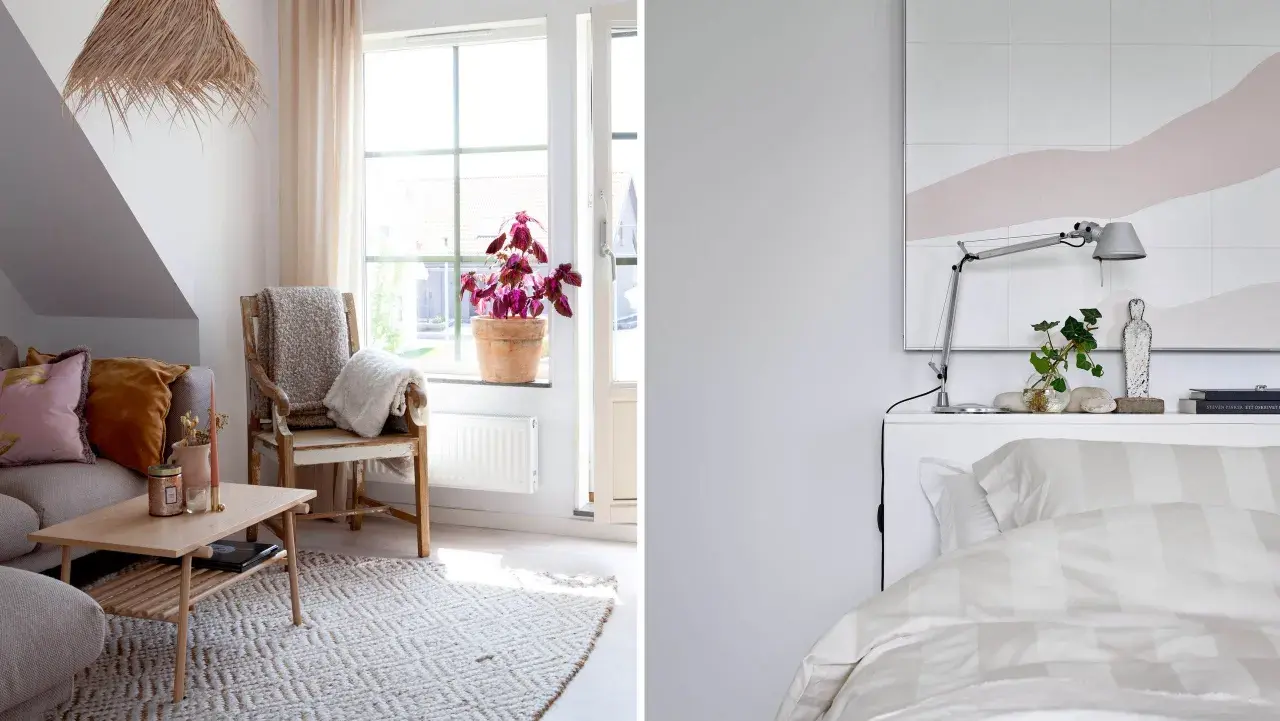 Mysigt litet sovrum med en säng med randigt påslakan och ett vardagsrum med soffa, fåtölj och ett lågt bord.