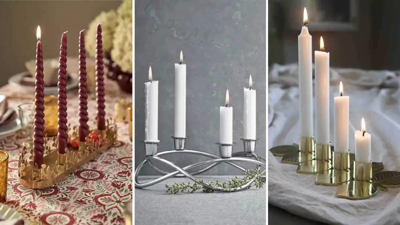 Tre adventsljusstakar med tända ljus. En med vridna röda ljus i en guldig ljusstake, en med vita ljus i en silverfärgad ljusstake och en med vita ljus i guldfärgade ljushållare formade som löv.