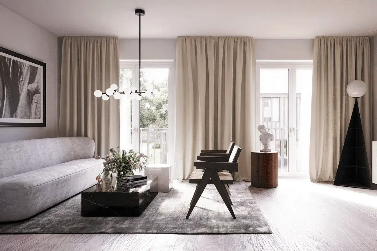En stilren vardagsrumsmiljö med en modern soffa, ett marmorbord och en tavla utan ram som pryder väggen.